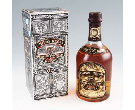 An old bottling of Chivas Regal 12 year old Blended Scotch Whisky with presentation box. 70cl. Thought to be from the 1970's.