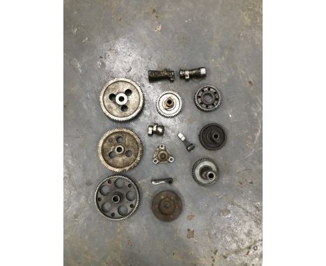 A quantity of believed Vincent engine componentsincluding cams, timing gears and other assorted items, condition and complete