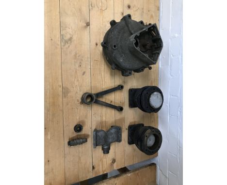 A partially complete and dismantled British Anzani enginenumbered MC8 441, crankcase mating numbers 410; together with two cy