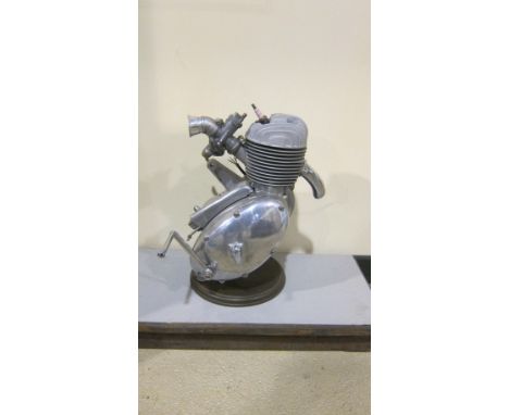 An unidenitied Two-stroke engineengine number *21381S*, mounted on base, condition and completeness unknown, close inspection