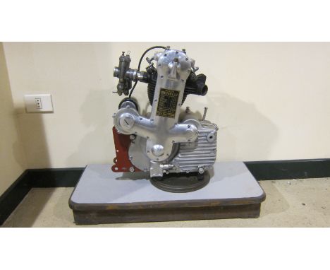 A Benelli Four-stroke OHC engineengine number 25-6510 and N4612, fitted with magneto and carburettor, mounted on base, condit