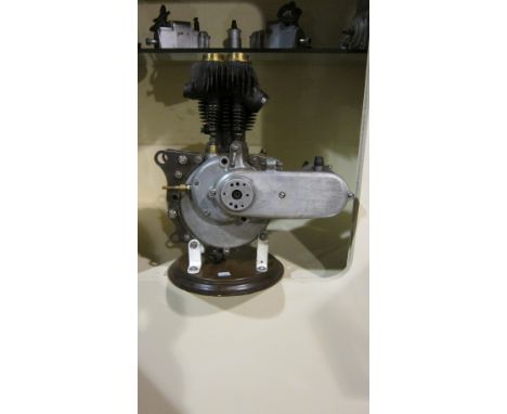 An unidentified Four-stroke engineengine number LW565, fitted with a ML Magneto, mounted on base, condition and completeness,