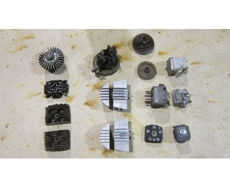 A quantity of engine componentsincluding Rotax, believed Motobi and others, condition and completeness unknown, close inspect