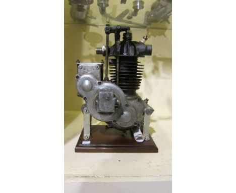 A believed Moser engineengine number 21 871, mounted on base, condition and completeness unknown, close inspection advised. L