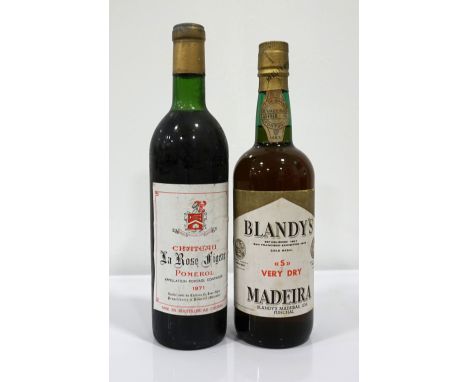 WINE & MADEIRA
A pair of bottles, comprising: one bottle of BLANDY'S "S" VERY DRY MADEIRA circa 1960's.  75cl.  No strength s