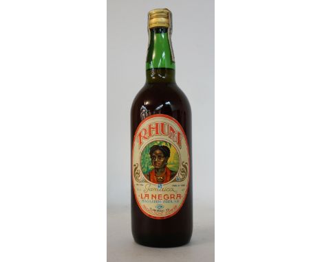 RHUM "LA NEGRA" CIRCA 1960
A nice bottle of RHUM LA NEGRA Jamaican Rum imported for the Spanish Market we estimate in the 196