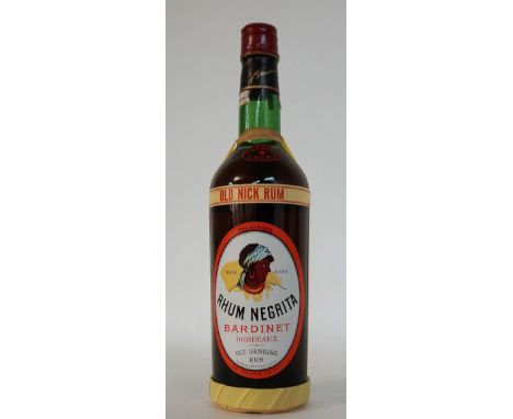 RHUM NEGRITA "OLD NICK RUM" C. 1950'S/ EARLY 60'S
An exemplary example of a great and rare bottle of Rhum from the 1950's/ ea