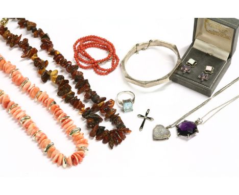 A collection of costume jewellery, to include a single row of amber freeform beads, simulated pearl necklaces, rings etc