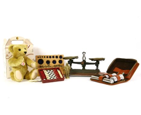 A Steiff bear, boxed, scales with weights, a novelty corkscrew, a travel chess set and a travelling shaving set