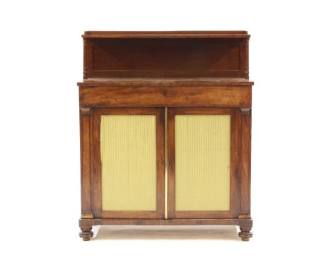 A 19th century mahogany chiffonier, with two column shelf over drawer and a pair of panelled doors, 92cm wide, 43cm deep, 112