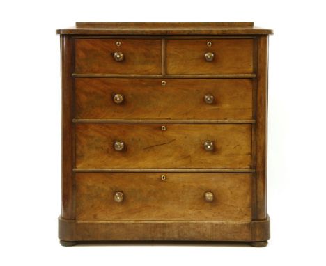 A large 19th century mahogany chest of drawers, the caddy top over two short and three long drawers, 125cm x 57cm x 130cm