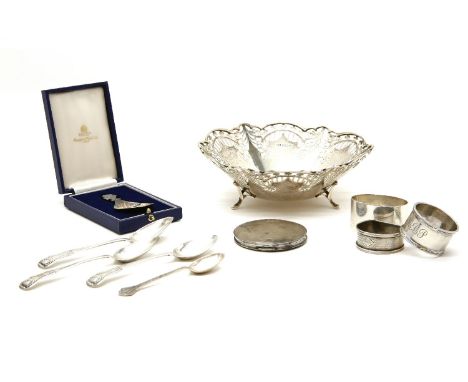 A pierced silver basket, by E V, Sheffield 1945, 3 napkin rings, compact, caddy spoon, and further items. 15oz weighable silv