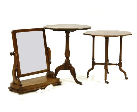 A George III mahogany tripod table, together with a walnut octagonal occasional table and a mahogany dressing table mirror