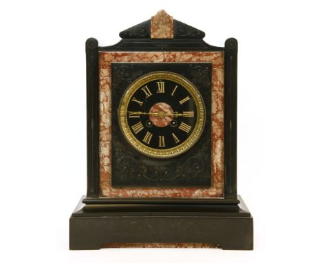 A Victorian black and rouge marble mantle clock, 36cm high