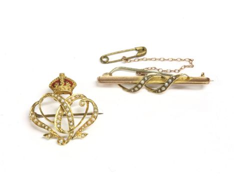 A gold enamel and seed pearl 1902 coronation brooch, red enamel crown to a scrolling seed pearl spray. Tested as approximatel
