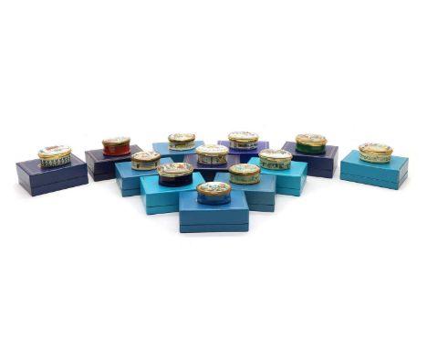 A complete set of enamelled Halcyon Days Limited Edition Christmas trinket boxes, dating from 1971 to 1982, each with a hand-