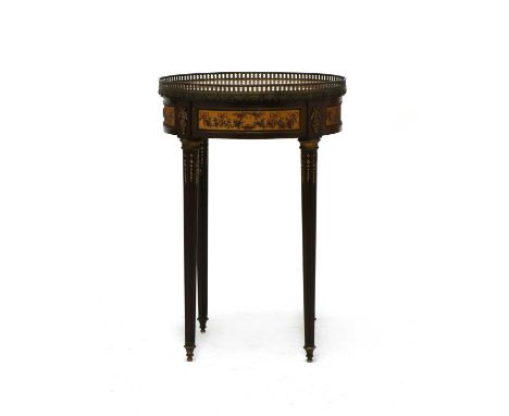 A Louis XVI style mahogany lamp table, by Edwards and Roberts, the rouge circular top above a frieze drawer with painted flor