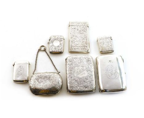 A Victorian silver cased purse, Birmingham 1884, visiting card case, Sheffield 1904, two pocket cigarette cases, Birmingham 1