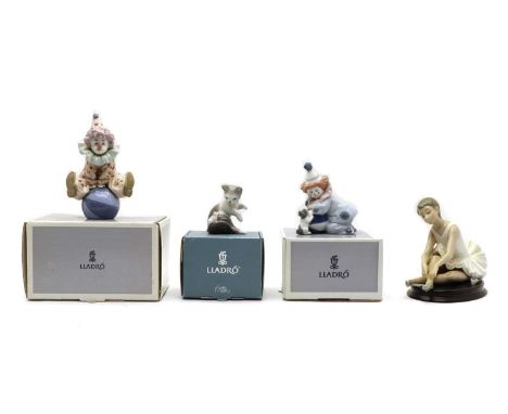 A collection of three Lladro figures, with original boxes, to include a porcelain figure titled Cat and Mouse, 8cm high, two 