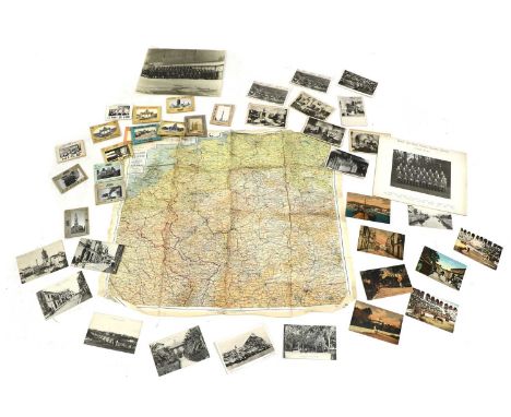 A collection of militaria &amp; postcards, comprising an un-named Defence Medal, War Medal and The France and Germany Star, w