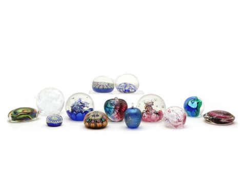 A collection of paperweights, to include four of Millefiori design one bearing the name of Strathearn, two in the form of an 