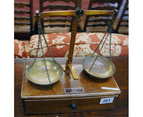 Pair of mahogany based brass scales with weights