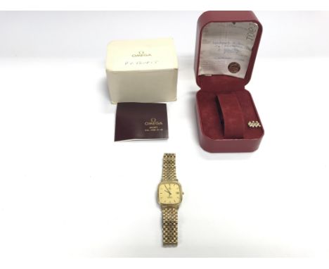 A gents vintage Omega seamaster watch with box and papers. Watch has engraving on back and has not been seen running.