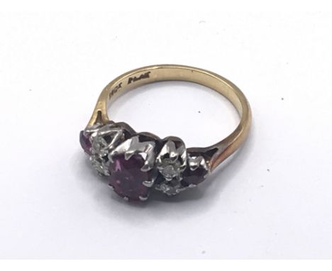 An 18carat gold ring set with ruby and diamonds. ring size I.