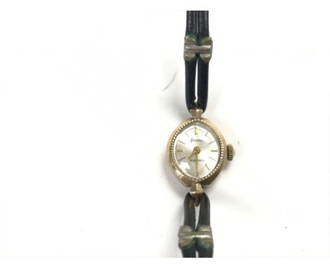 A small ladies vintage 9ct gold Accurist watch not seen working.
