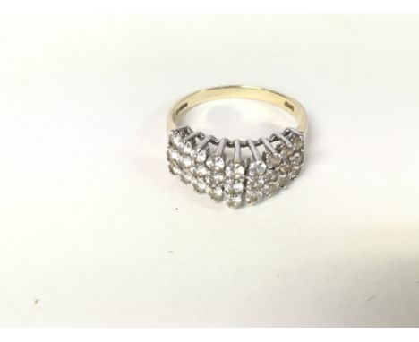 A 9ct gold white stone set ring. Size R and 4.34g.