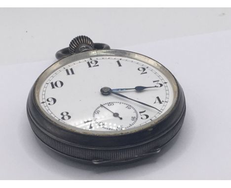 A silver button wind open face watch with enamel dial.