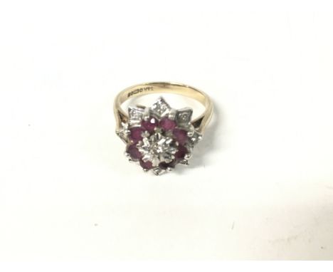 9ct gold ruby and diamond ring. Size K and 3.34g.