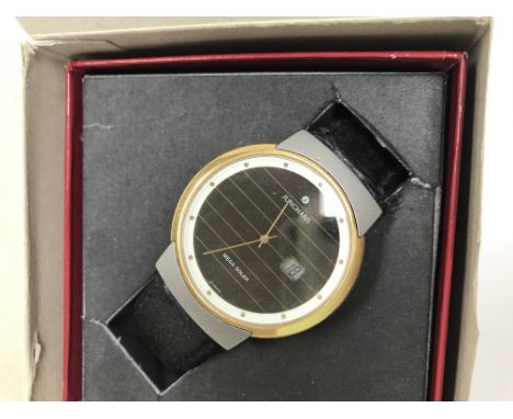 A Boxed Junghans Mega solar watch in original box.