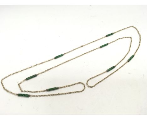 An Edwardian gold enamel chain. 9g.