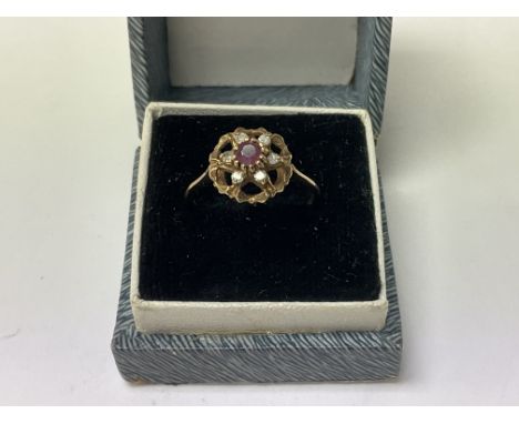 A 9ct gold Ruby and diamond ring. N.