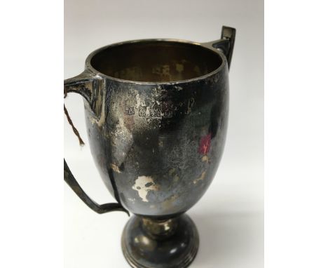 A silver twin handle trophy cup Birmingham 1938 , 234 grams.