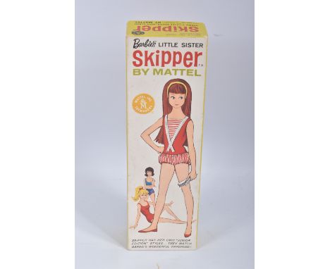 A BOXED MATTEL SKIPPER DOLL, No.0950, straight leg brunette version, wearing red and white swimsuit, with gold headband (tarn