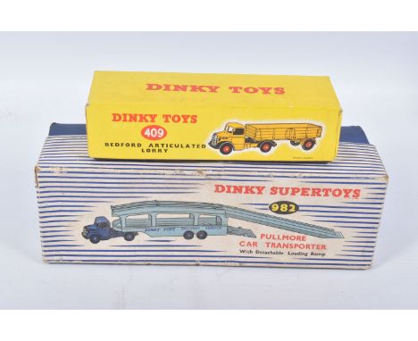 A BOXED DINKY SUPERTOYS BEDFORD PULLMORE CAR TRANSPORTER, No.982, darker blue cab and hubs, lighter blue trailer, with yellow