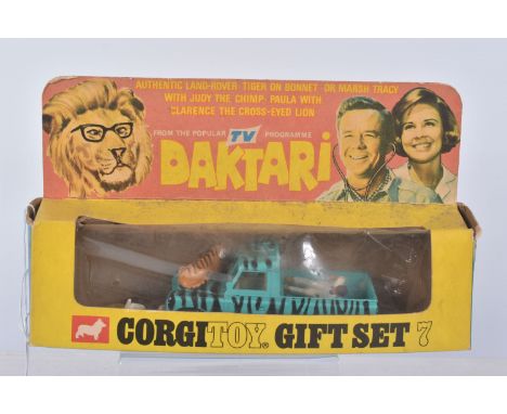 A BOXED CORGI TOYS DAKTARI GIFT SET No.7, missing Chimp but complete with all other figures and Land Rover, all in fairly goo