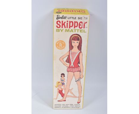 A BOXED MATTEL SKIPPER DOLL, No.0950, straight leg blonde version with Skipper label to left wrist, wearing red and white swi