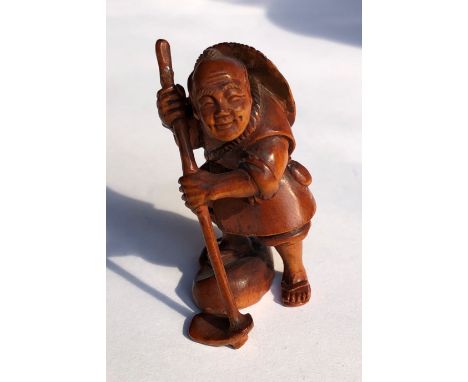 JAPANESE NETSUKE OF A FARMER