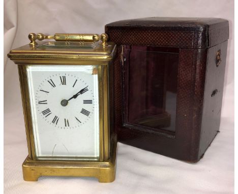 A BRASS CARRIAGE CLOCK IN CARRY CASE A/F 13 CM HIGH 