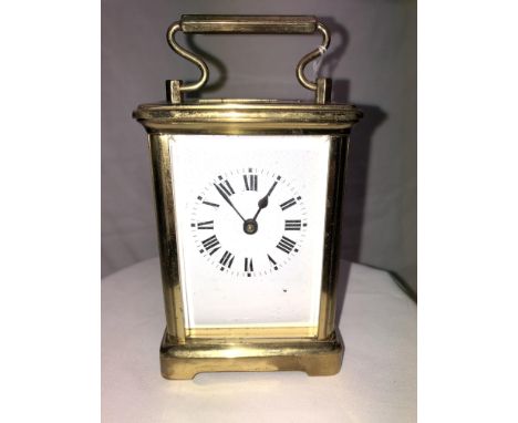 A FRENCH BRASS 5 PANE CARRIAGE CLOCK NUMBERED 7036-15CM HIGH  