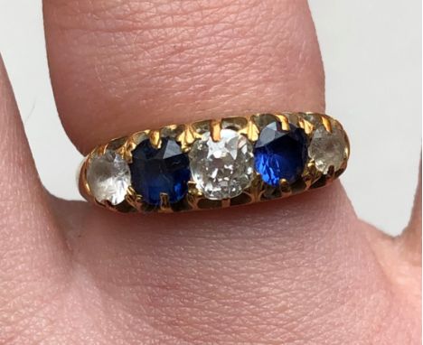 9CT GOLD SINGLE DIAMOND RING WITH TWO CZ STONES AND TWO SAPPHIRE STONES SIZE L 3.9g APPROX (5 STONES ALTOGETHER)