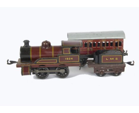 A Bing O Gauge Clockwork LMS 0-4-0 Locomotive Tender and Coach, in LMS maroon with no 1924 to cabsides, uncommon sans-serif '