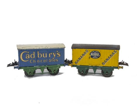 Hornby O Gauge Cadbury and Fyffes Private Owner Vans, unboxed, both with 'T3' bases, Cadbury's in blue with light green under