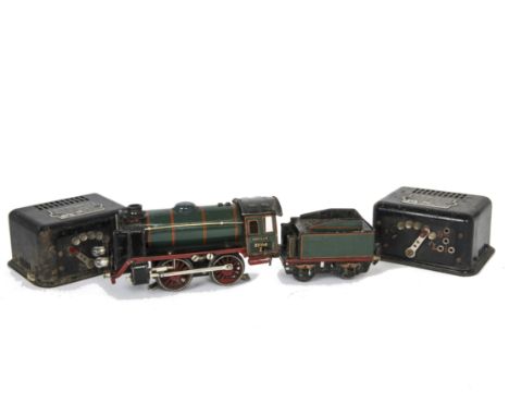 A Märklin O Gauge Electric R66/12910 0-4-0 Locomotive Tender and Controllers, the locomotive in red-lined green as no 910 wit