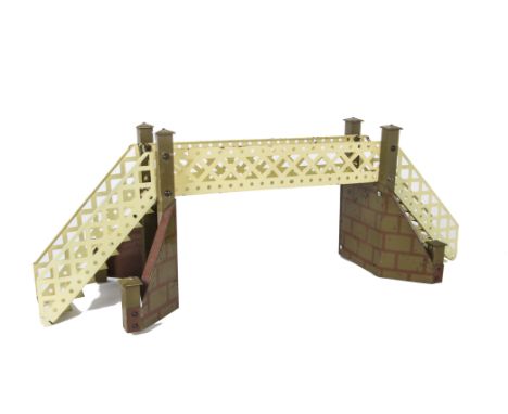 An Early Hornby O Gauge Lattice Girder Bridge, circa 1922, with cream girder and step sections, reddish-brown mortar on 'mudd