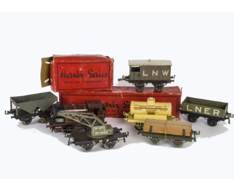Hornby O Gauge Clockwork LMS Tank Locomotive and OAG Freight Stock, the locomotive a no 1 tank as LMS 2115, F, mech tested ok