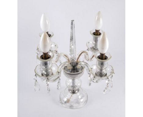 Four branch cut glass table lamp, with central prism, height 38cm.